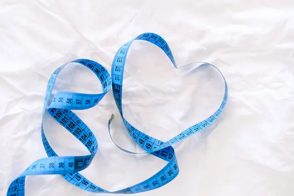 Cinta métrica en forma de corazón